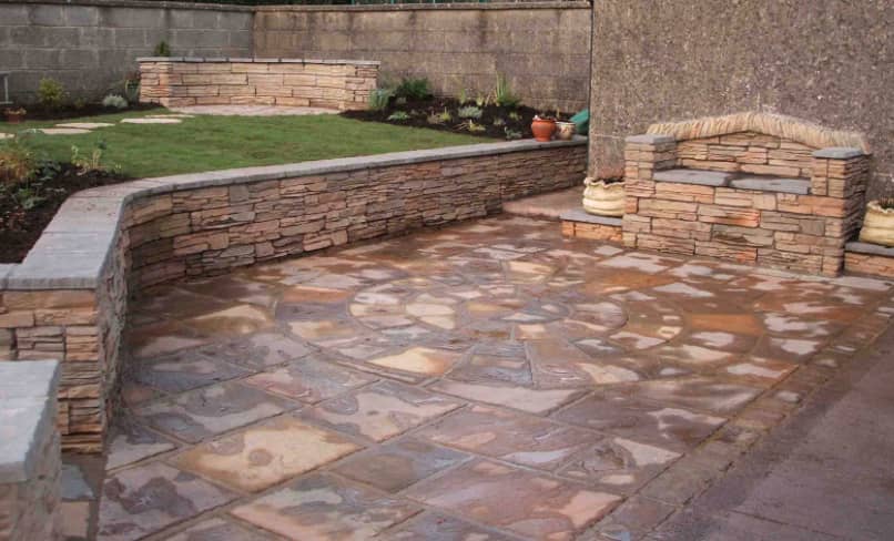 Weathered Riven paving with Reesig Wall blocks - mixed colours